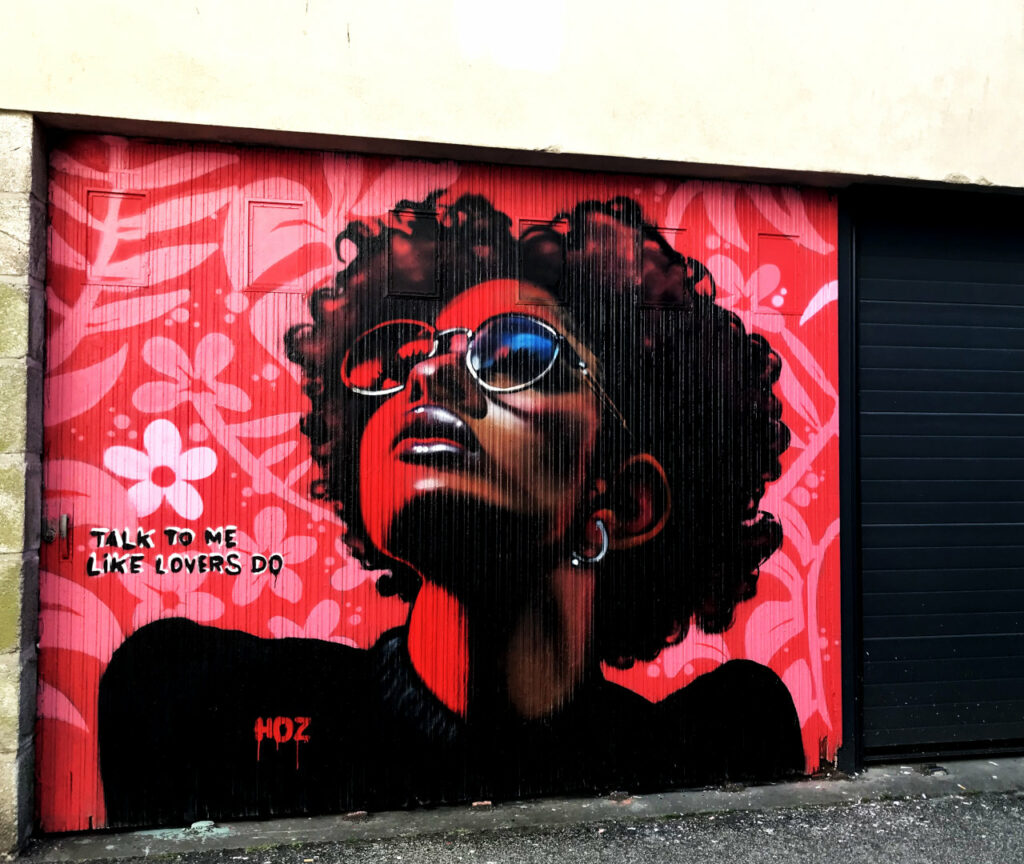 Portrait graffiti d'une femme par HOZ - Mai 2025